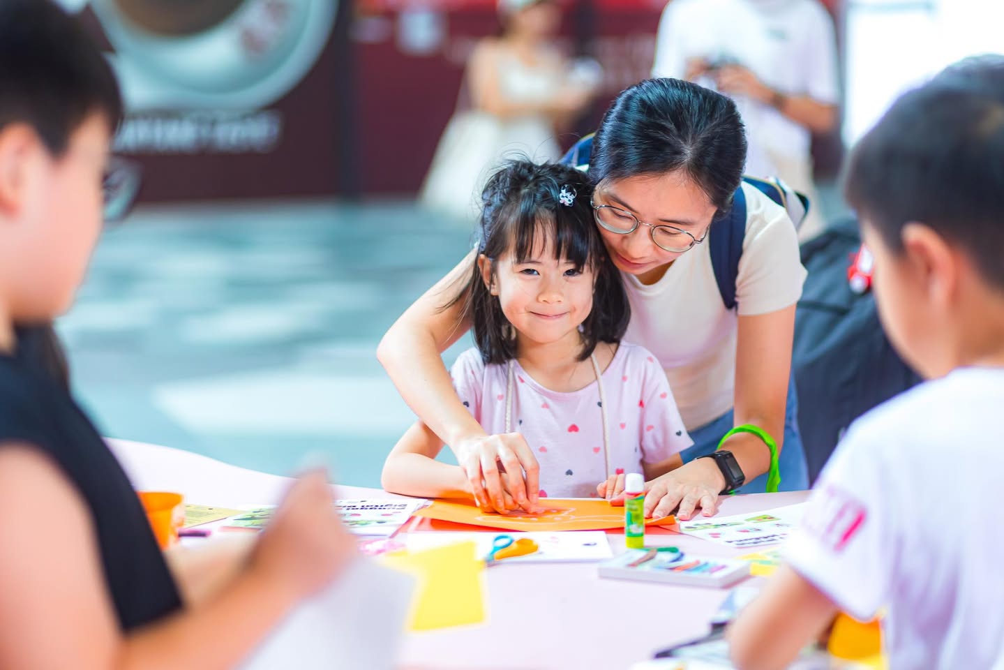 Visitors engaging with an interactive art installation at WonderLab.