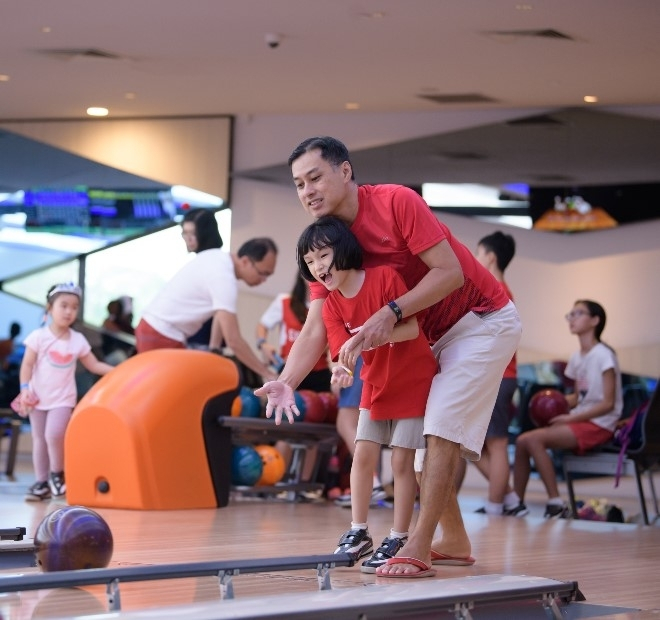 Family bowling at SAFRA Punggol, the club that hosts Learn and Grow Family Fair on Level 3 from 6 to 8 November 2026