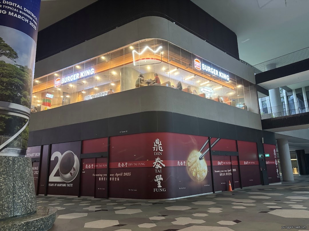 Exterior view of Burger King on an upper floor in a mall.