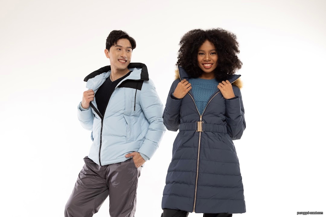 Two models wearing winter coats against a plain white background.