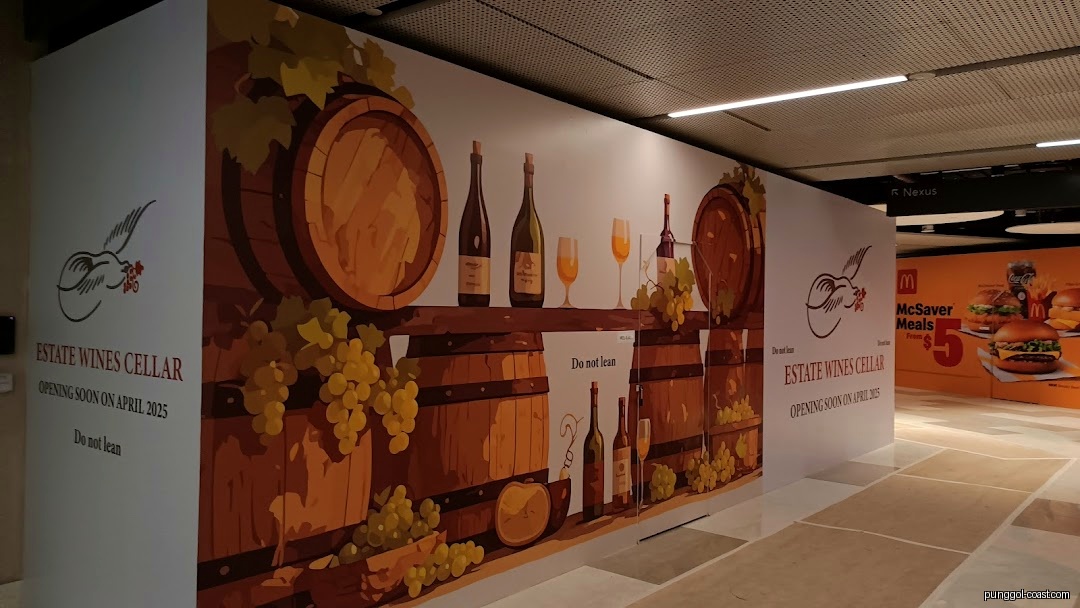 Hoarding for Estate Wines Cellar, opening soon, with wine barrel mural.