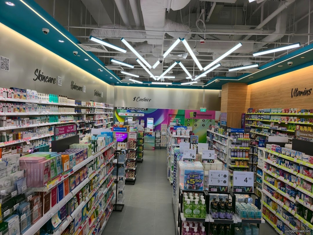 Interior view of a Watsons store with aisles of products and self-checkout.