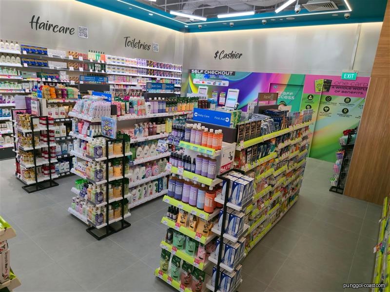 Interior view of a Watsons store with aisles of haircare and toiletries, and self-checkout.