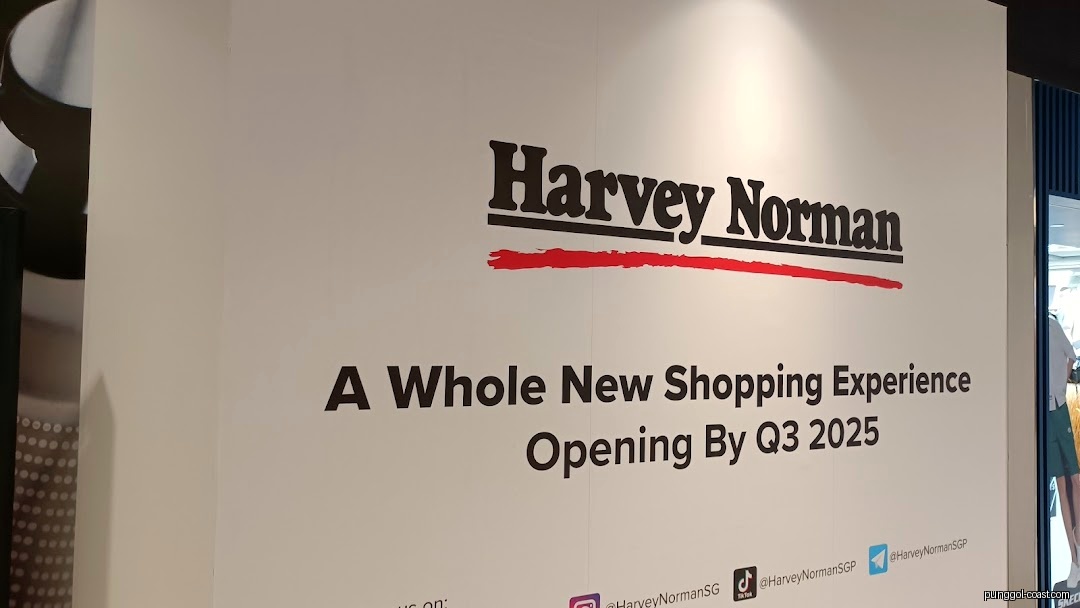Hoarding announcing Harvey Norman's new shop opening by Q3 2025.