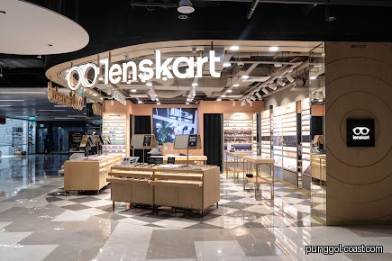 Lenskart shop entrance with display tables and interior visible from the mall.
