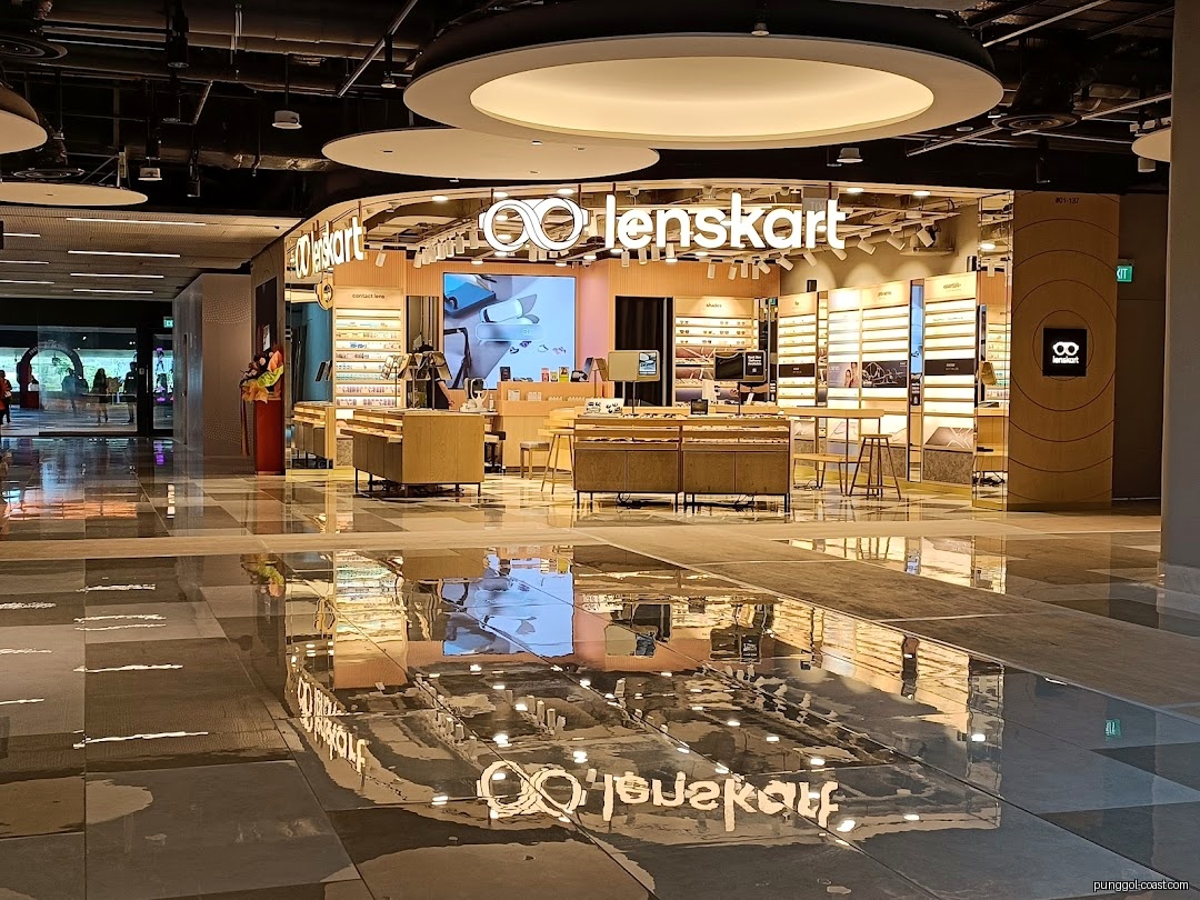 Lenskart shop entrance in a mall with a highly reflective floor.