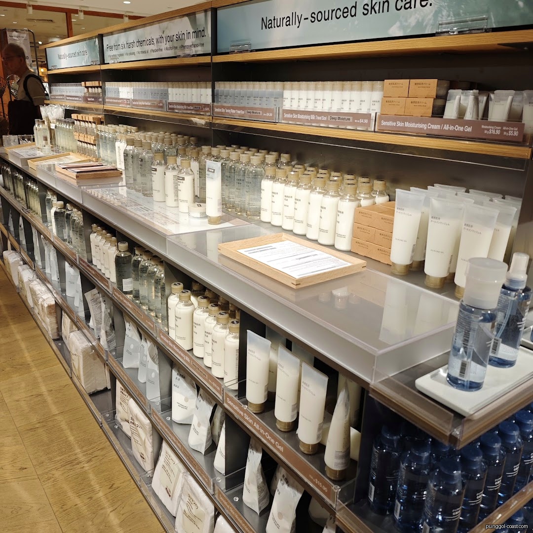 Shelves filled with various skincare products in a retail shop.