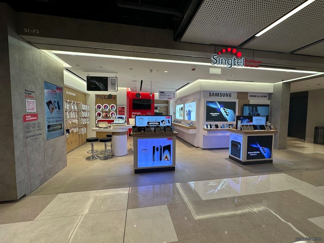 Interior view of a Singtel retail store with mobile phone and accessory displays.
