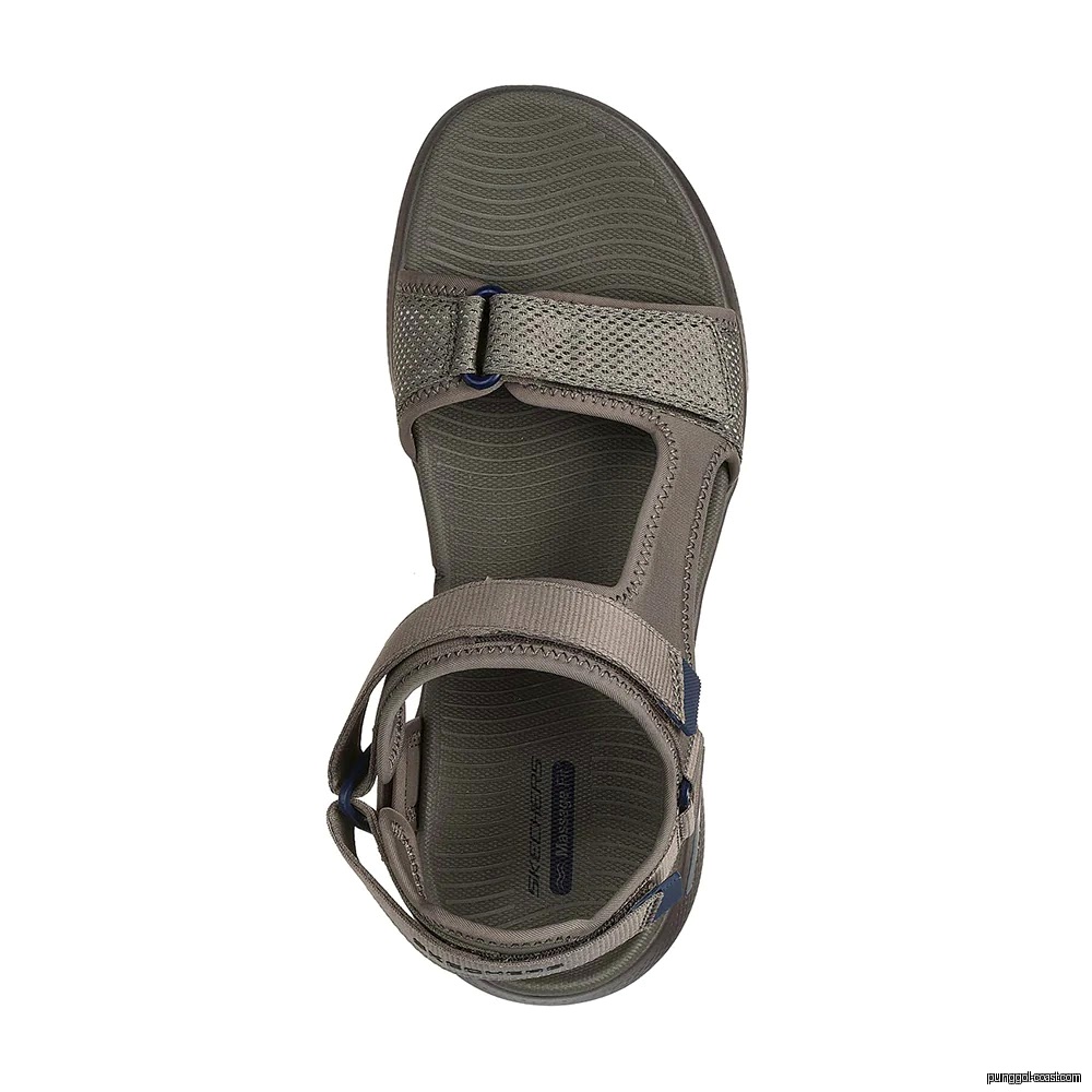 Top-down view of a single grey/green Skechers sandal on a white background.