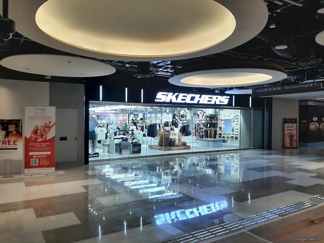 Skechers shop exterior in a mall with a large storefront display.