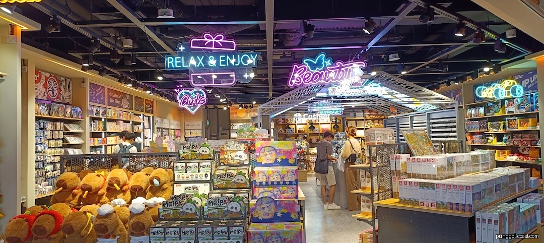 Shop interior with plush toys, puzzles, customers, and neon signs.