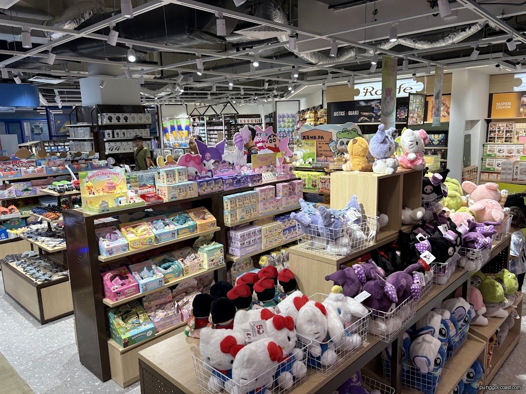 Interior of a retail shop filled with various plush toys and merchandise.